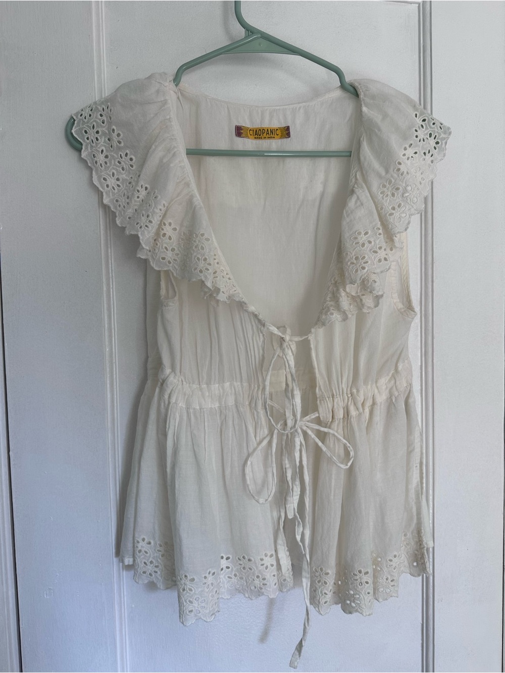 Cream Eyelet Tie-Front Peplum Top